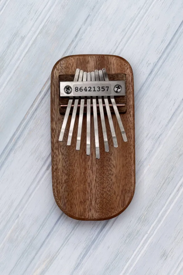 Mountain Melodies Manufacturing Inc Mahogany Thumb Piano Earrings