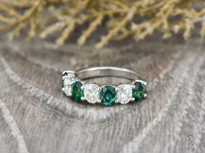 Rings Sapheena Jewelry Ivy 25 Ct Oval Cut Moissanite and Green Emerald Half Eternity Wedding Band
