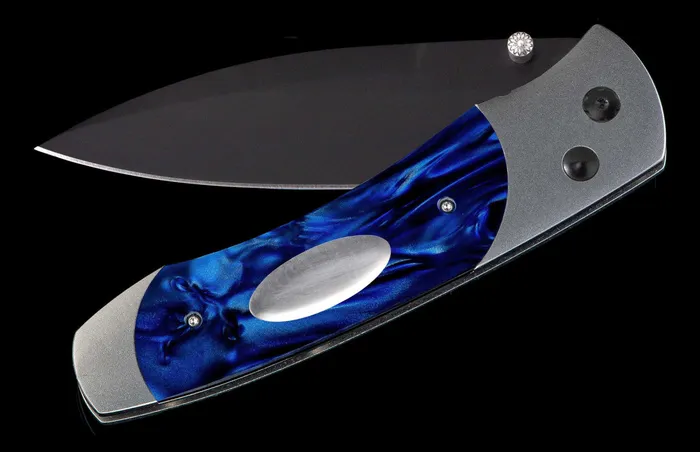 Titanium pocketknife with compressed acrylic resin and stainless blade WILLIAM HENRY LLC Necklaces Titanium pocketknife with compressed acrylic resin and stainless blade WILLIAM HENRY LLC Necklaces