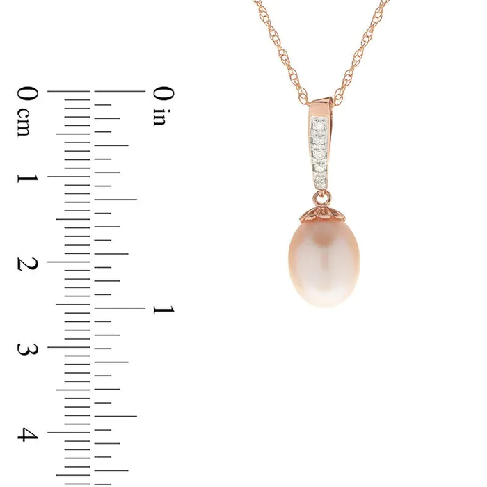 80 85mm Oval Pink Cultured Freshwater Pearl and Natural Diamond Accent Pendant in 14K Rose Gold Goldia Necklaces 80 85mm Oval Pink Cultured Freshwater Pearl and Natural Diamond Accent Pendant in 14K Rose Gold Goldia Necklaces