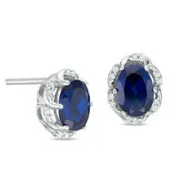 Goldia Earrings Oval LabCreated Blue Sapphire and 01 CT TW Diamond Frame Stud Earrings in Sterling Silver Goldia Earrings Oval LabCreated Blue Sapphire and 01 CT TW Diamond Frame Stud Earrings in Sterling Silver