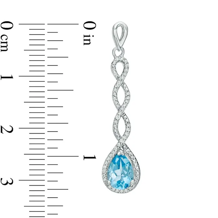 Goldia Earrings PearShaped Blue Topaz and 02 CT TW Diamond Frame Cascading Drop Earrings in 10K White Gold Goldia Earrings PearShaped Blue Topaz and 02 CT TW Diamond Frame Cascading Drop Earrings in 10K White Gold