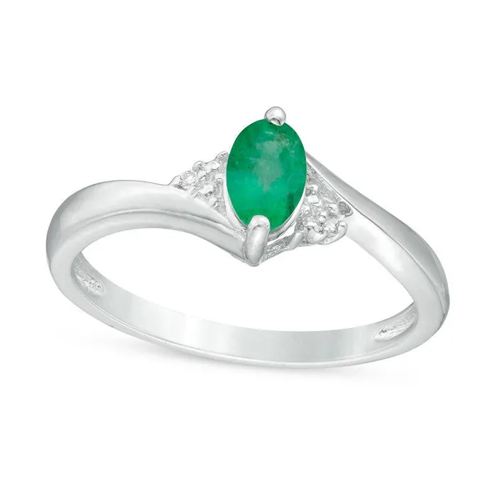 Goldia Rings Oval Emerald and Natural Diamond Accent Bypass Ring in Sterling Silver Goldia Rings Oval Emerald and Natural Diamond Accent Bypass Ring in Sterling Silver
