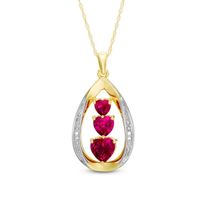Necklaces Goldia HeartShaped LabCreated Ruby and Diamond Accent Linear Three Stone Pendant in 10K Yellow Gold Necklaces Goldia HeartShaped LabCreated Ruby and Diamond Accent Linear Three Stone Pendant in 10K Yellow Gold